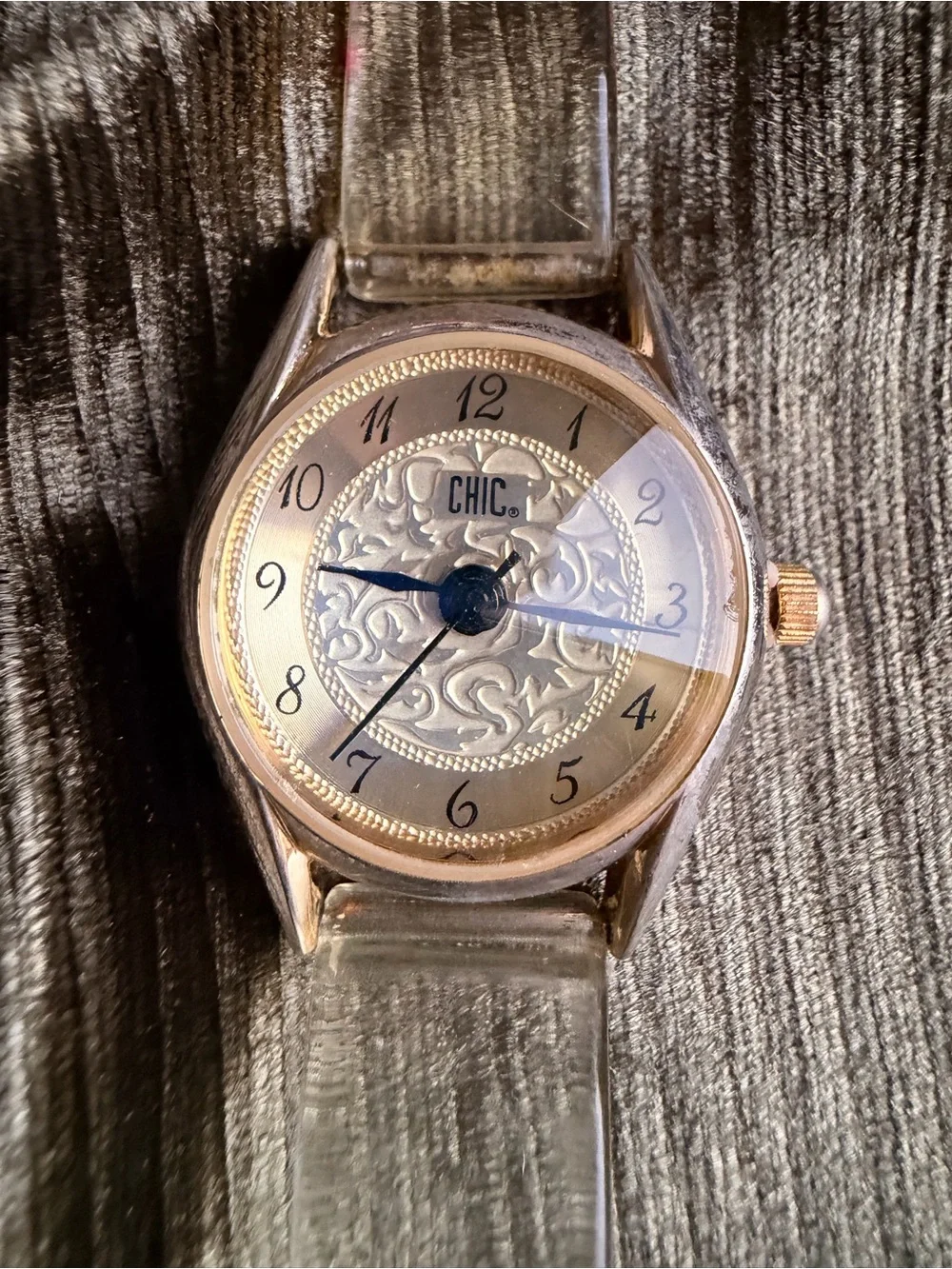 chic Gold-Tone Watch with Clear Band and Black Hands